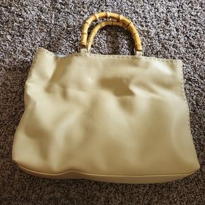 Tan purse with bamboo handles